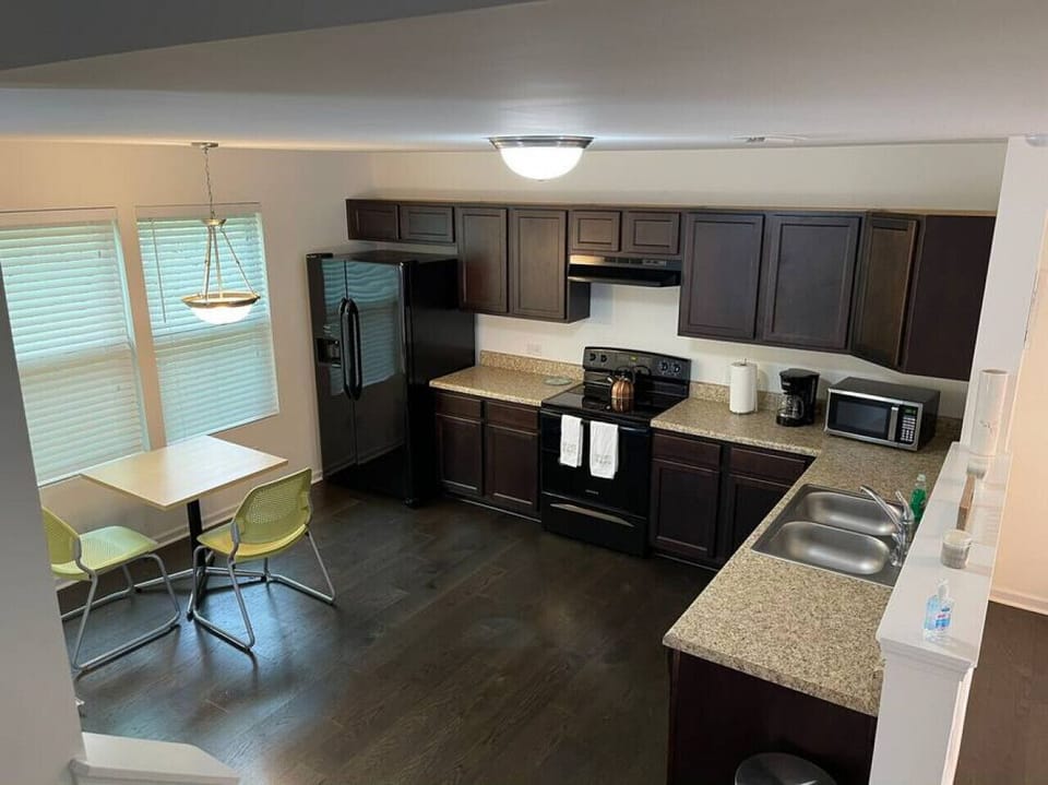 Fully equipped kitchen with modern appliances in this Charlotte short-term rental near Uptown