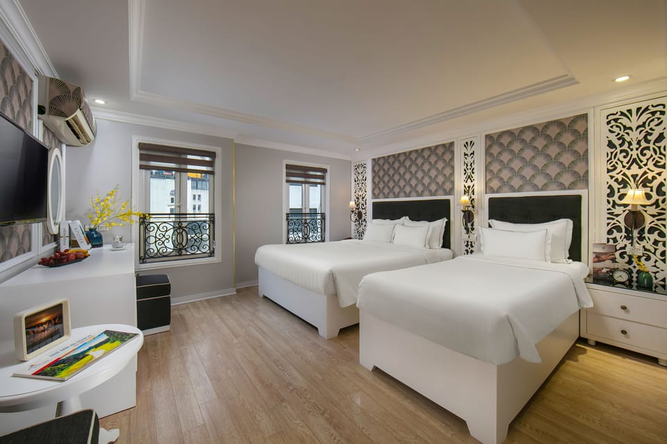 Family Triple Room, City View | Minibar, in-room safe, soundproofing, rollaway beds