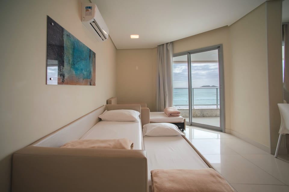 Family Studio Suite, Ocean View | Minibar, in-room safe, desk, blackout drapes