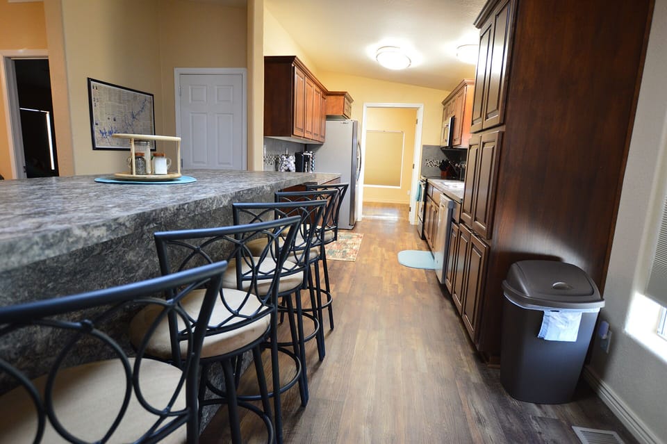 Dinning Room Table / Bar looking into the kitchen