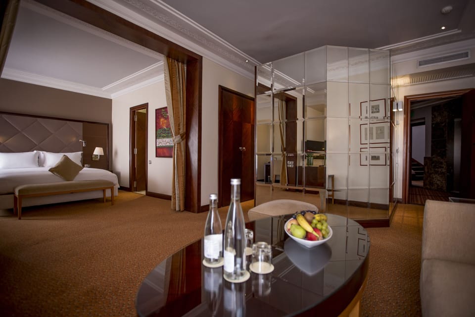 Deluxe Suite, 1 Queen Bed | Minibar, in-room safe, desk, laptop workspace