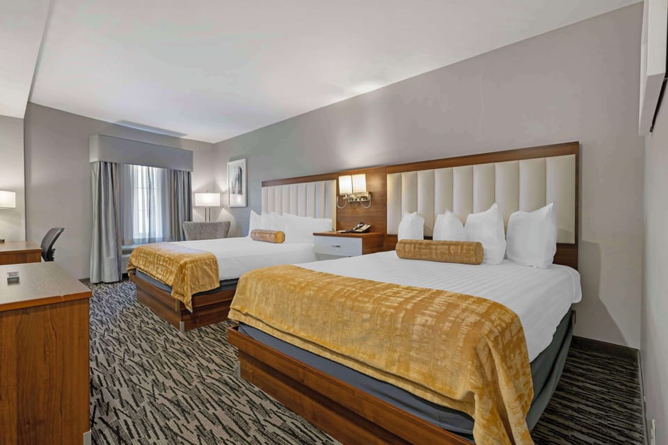 Standard Room, 2 Queen Beds, Smoking | Desk, laptop workspace, blackout drapes, iron/ironing board
