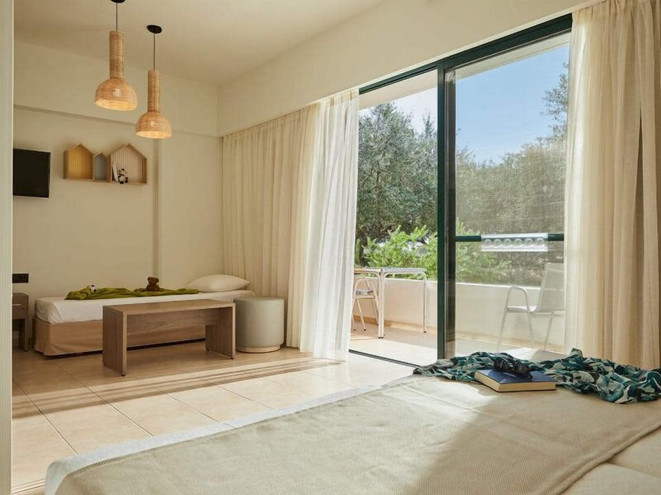 Apartment, 1 Bedroom, Garden View (sliding door) | Desk, blackout drapes, free cribs/infant beds, travel crib