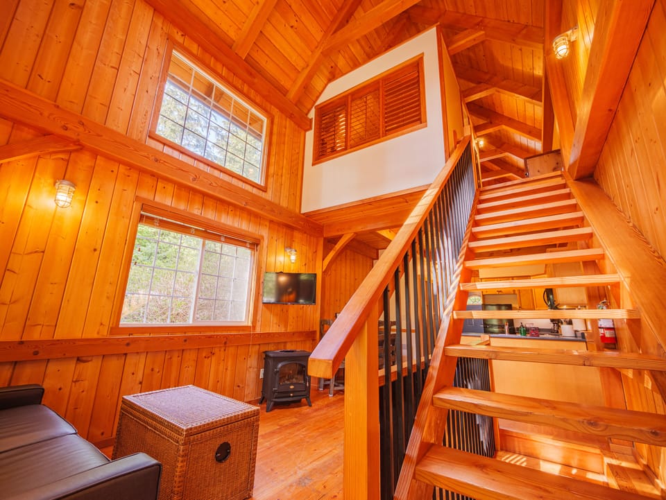 Cabin, 2 Bedrooms (Rainforest) | Living area | 10-inch TV with cable channels