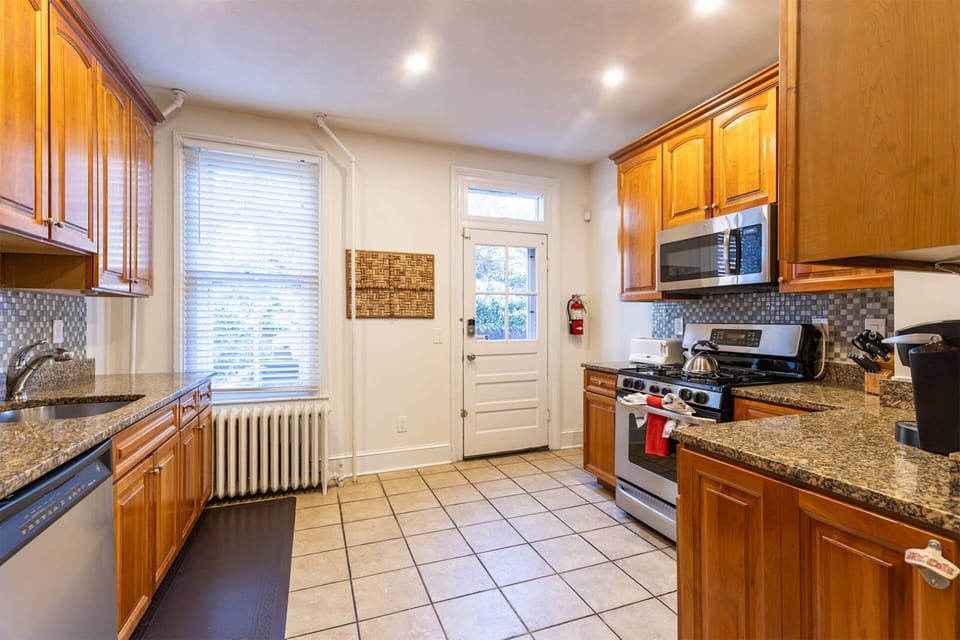 Walk through the family room to the spacious full kitchen.
