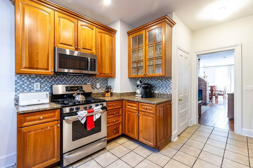 The stainless steel oven with cooktop and microwave.