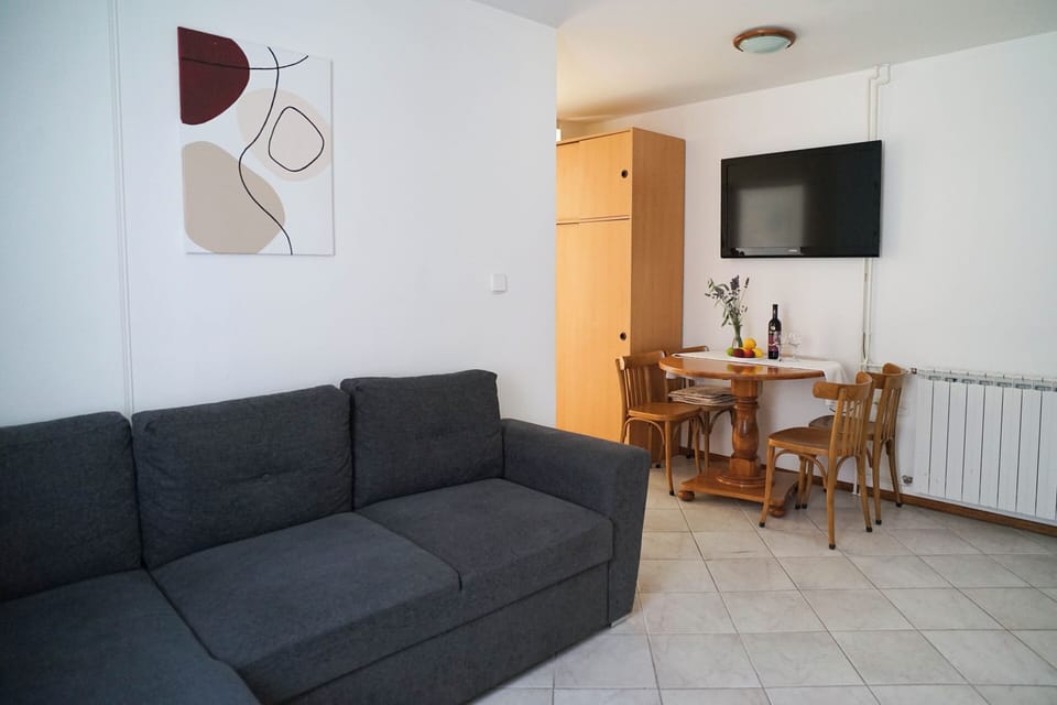 Family Apartment, 1 Bedroom | Living area | LCD TV