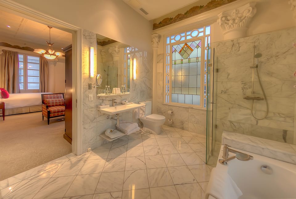 Premium Room, 1 King Bed | Bathroom | Combined shower/tub, eco-friendly toiletries, hair dryer, bathrobes