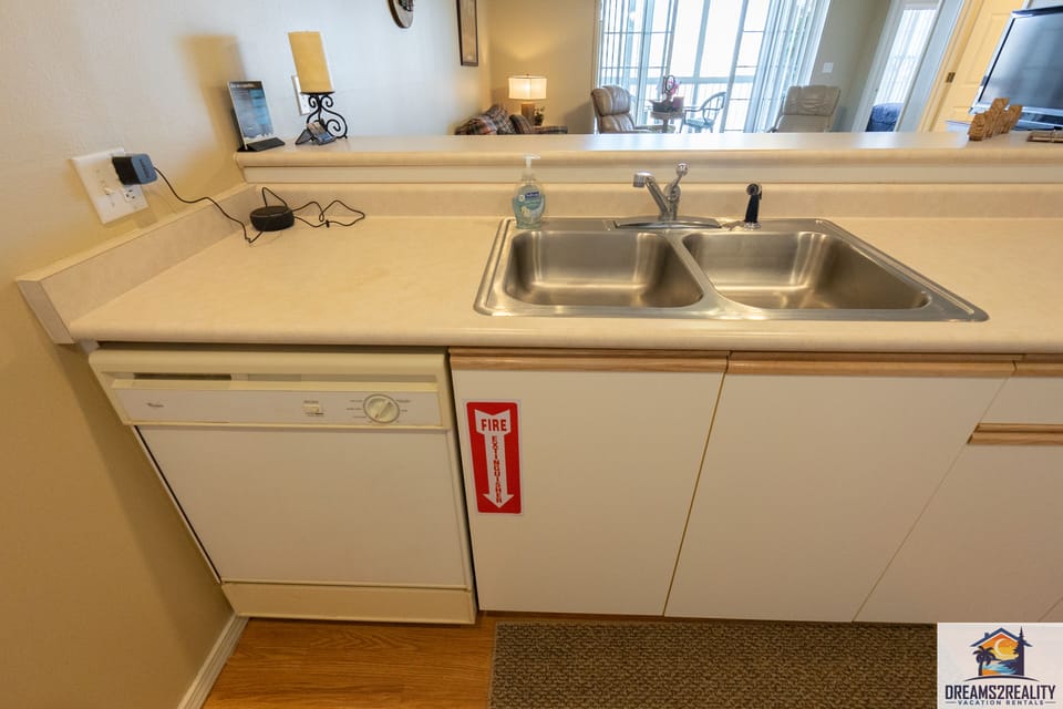 Dishwasher in Kitchen~ Fire Extinguisher Provided under Sink
