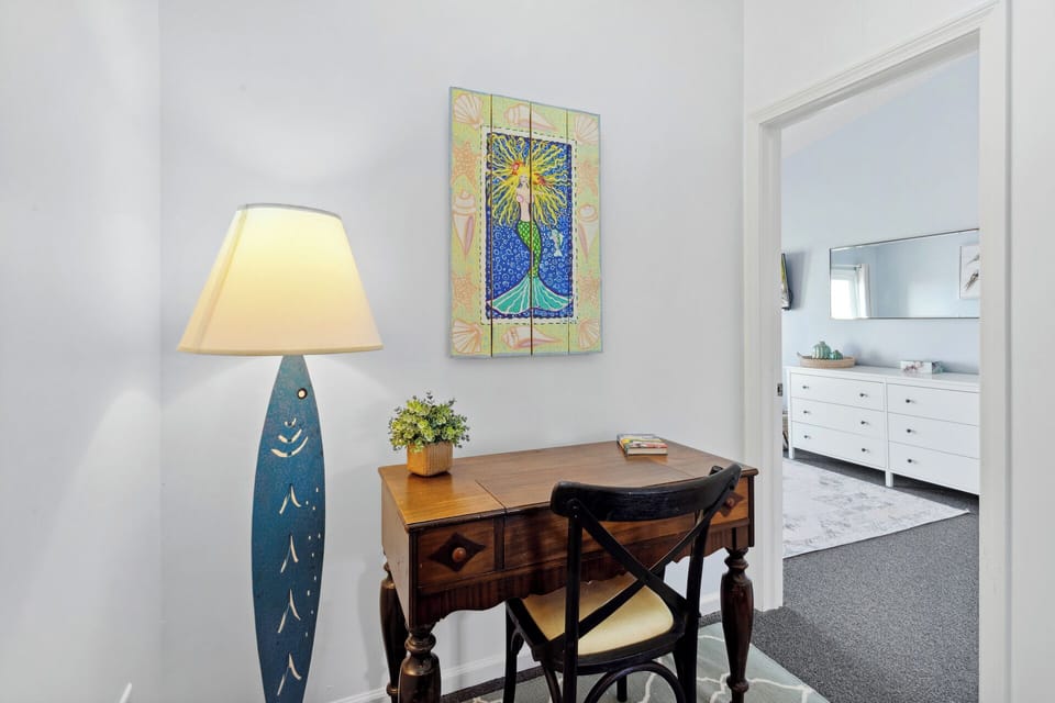 You'll also find a functional desk and upstairs office area that offers the perfect dedicated space for those times when you've got to get some work.