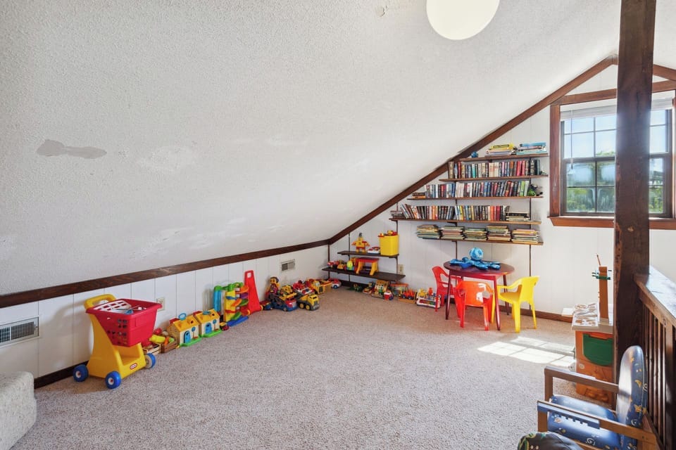 The Top-Level Loft is a wonderful recreation space with toys, a Flat Screen TV, and a library of games, movies, and books to enjoy!