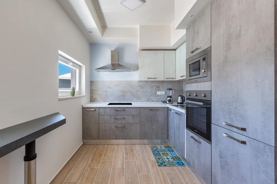 Villa | Private kitchen | Full-size fridge, microwave, oven, espresso maker