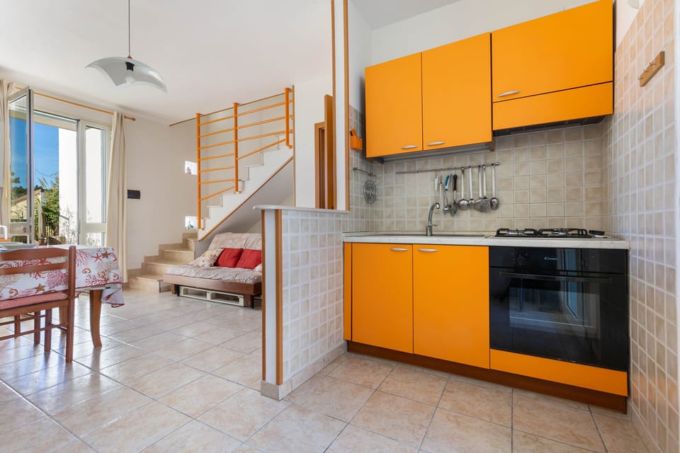 Villa | Private kitchen | Full-size fridge, oven