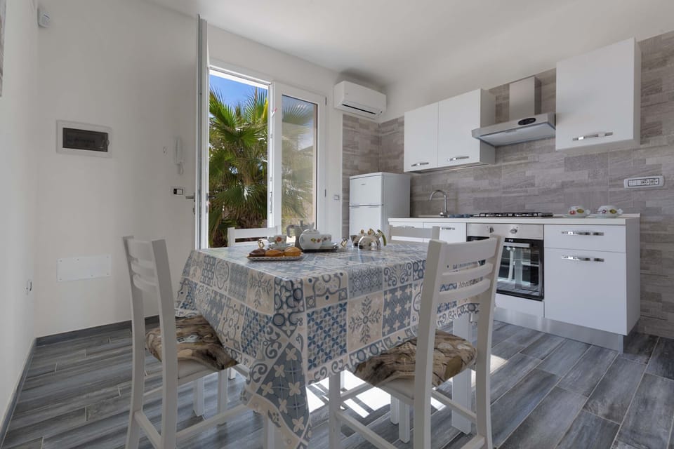 Villa | Private kitchen | Full-size fridge, oven