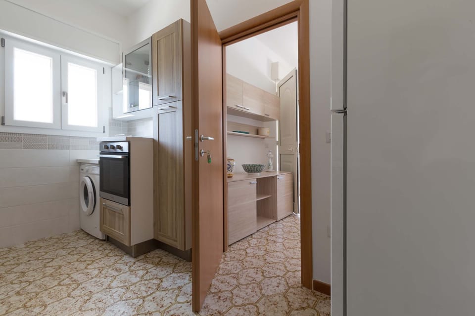 Villa | Private kitchen | Full-size fridge, microwave, oven, dishwasher