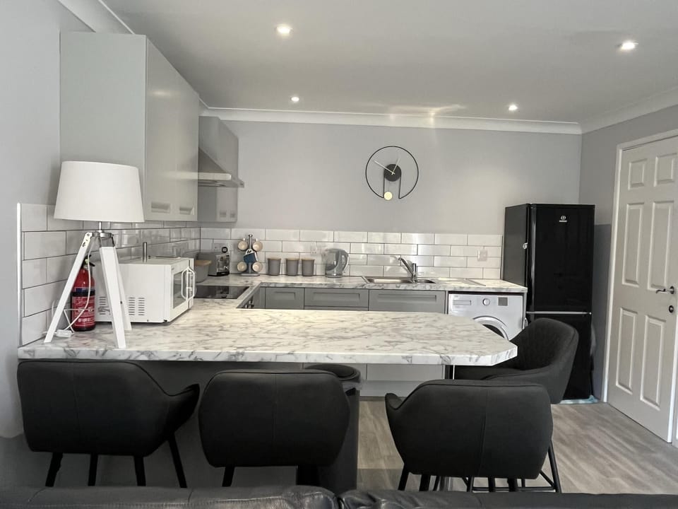 Villa | Private kitchen | Fridge, microwave, oven, stovetop