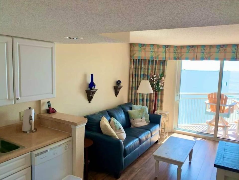 You can see the ocean from the kitchen. Large flat screen TV is in the living rm