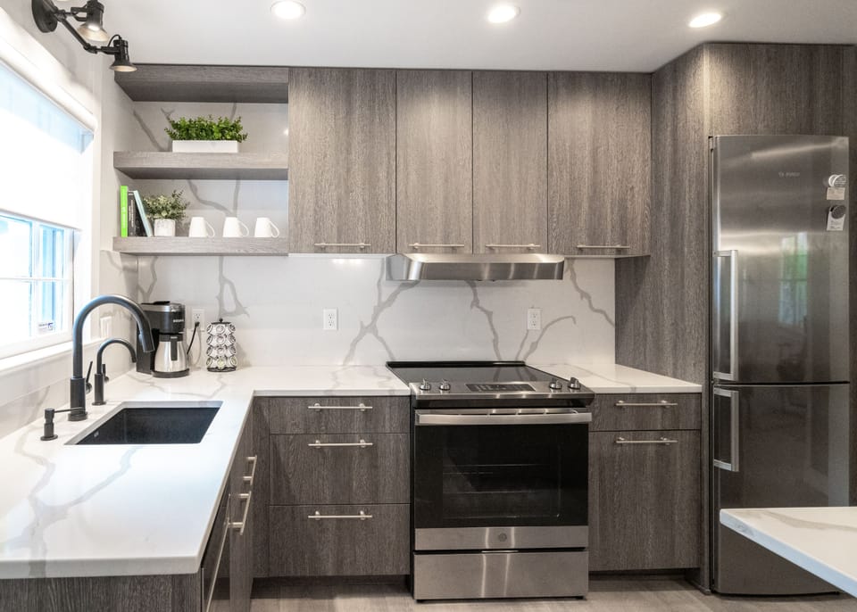 Dishwasher, oven & refrigerator.  Microwave is in dining room cabinet 