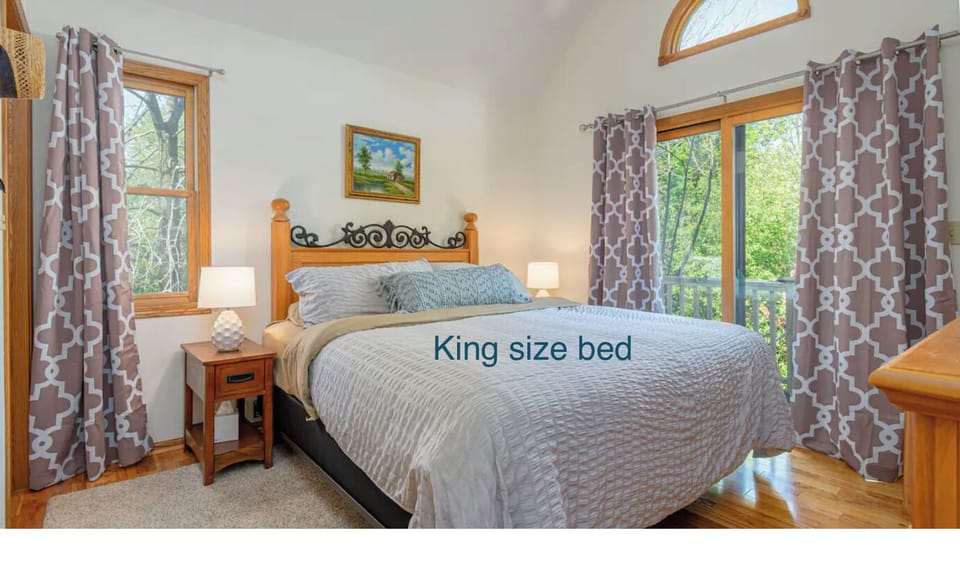 Main bedroom with king bed and private bathroom and balcony. 