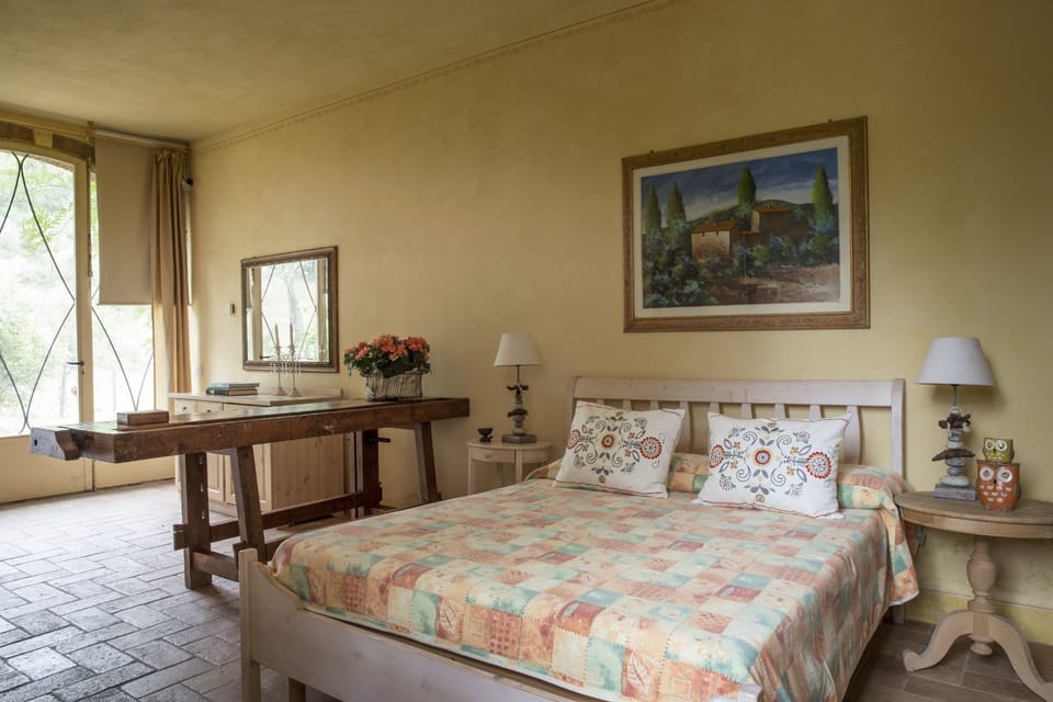 The limonaia suite has a little kitchen of its own and french windows out to the garden