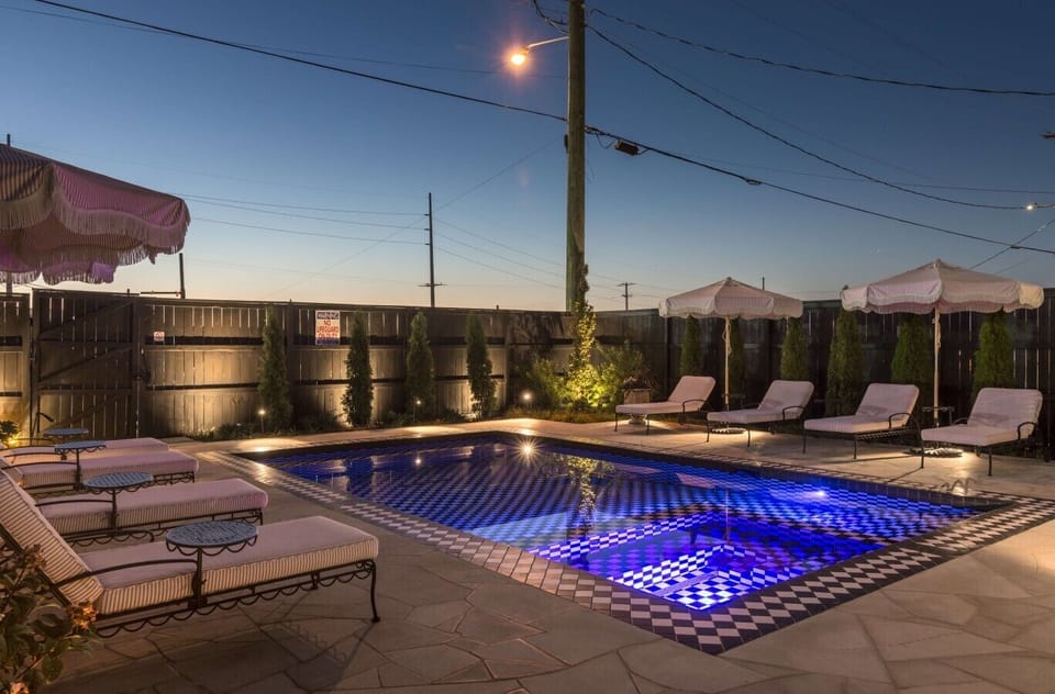 13 - Pool at Dusk with Loungers