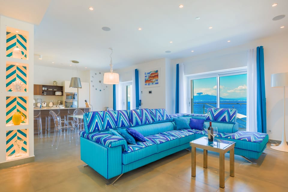 Luxury Villa | Living area | 50-inch flat-screen TV with satellite channels, TV, fireplace