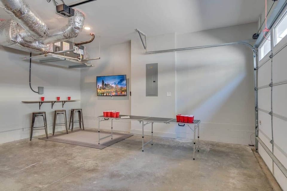 The garage becomes your game room with a tournament table and TV running in the background while your group rotates through matches
