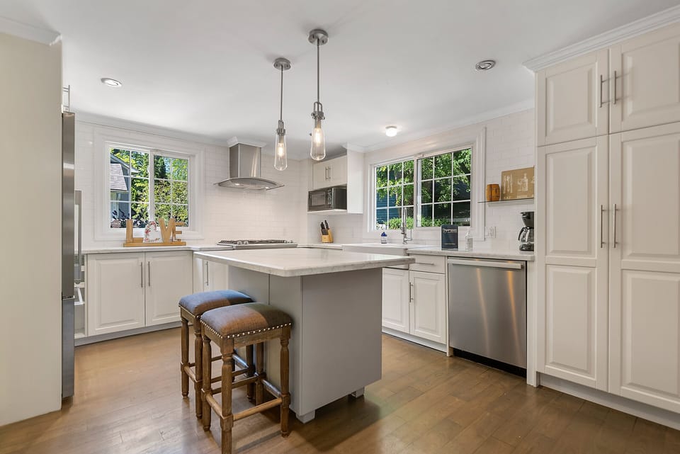 Full kitchen with fridge, stove, dishwasher at The Rosette House in Old Town Niagara-on-the-Lake