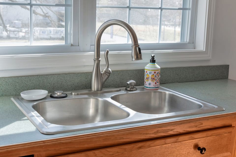 Sink with view of the front yard