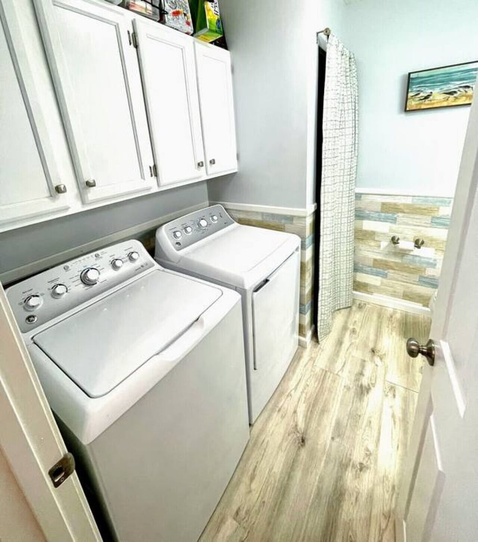 A second full-size washer and dryer serve Condo 2 for convenient packing and longer stays.