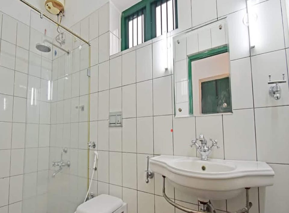 Shower, rainfall showerhead, towels, soap