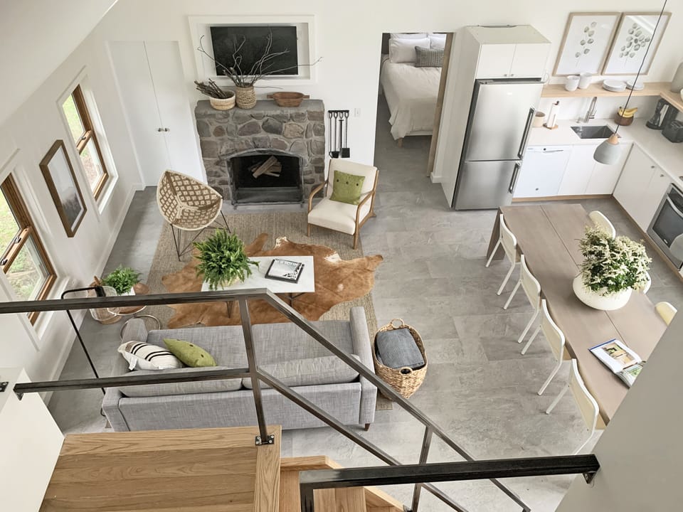 looking from the loft down to the living dining kitchen areas