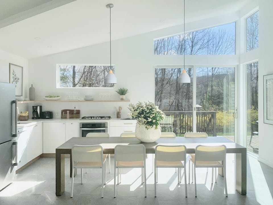 10' table with amazing views to backyard and out onto the deck