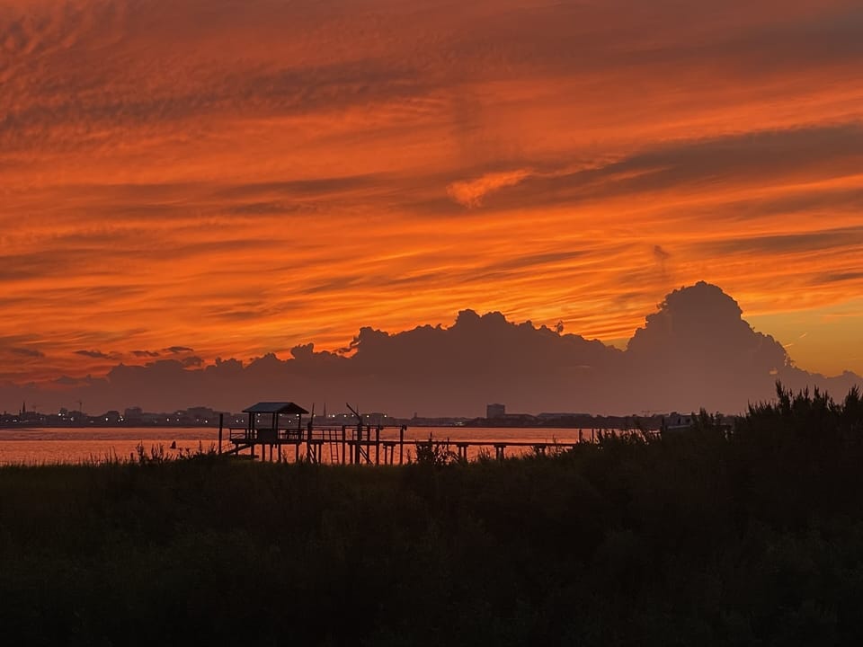 Sunset view from Mt Pleasant to Charleston at Alhambra Hall