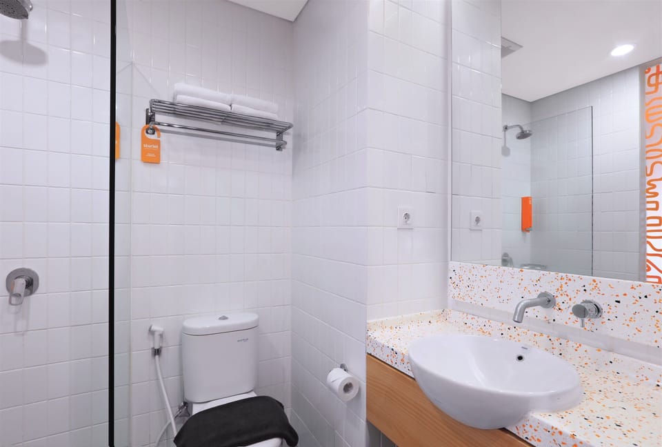 Shower, slippers, bidet, towels