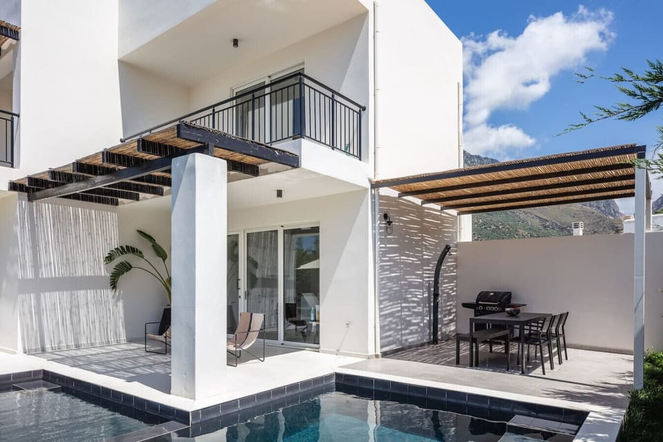 Step out into your own private pool surrounded by lush calmness.
