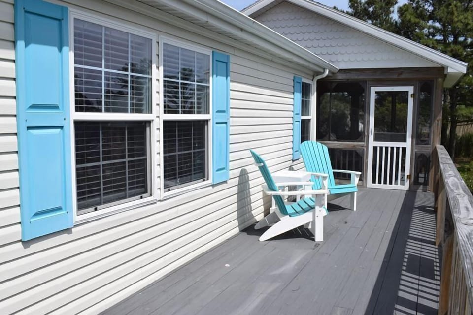 Deck leads to screened porch 