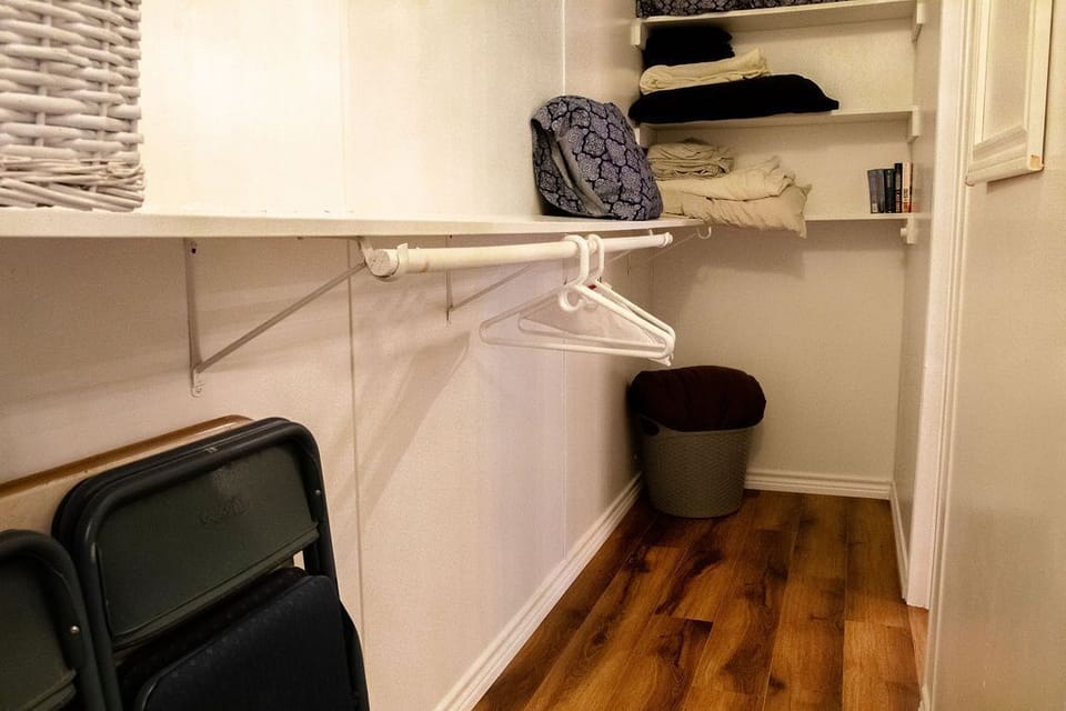 In the master closet you will find extra linens, towels, pillows, and more. 