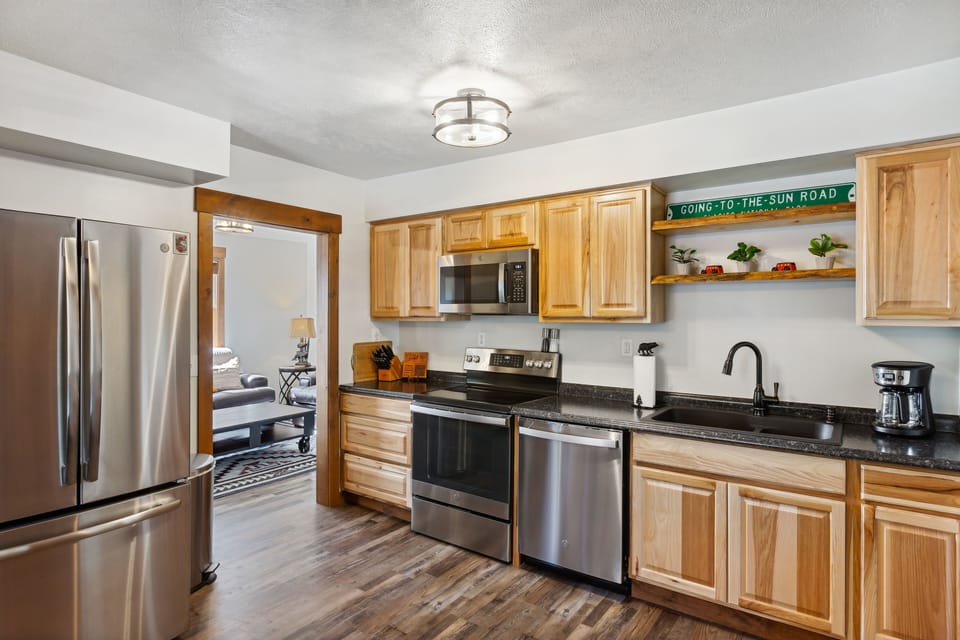 New appliances with large double door fridge and freezer drawer. 