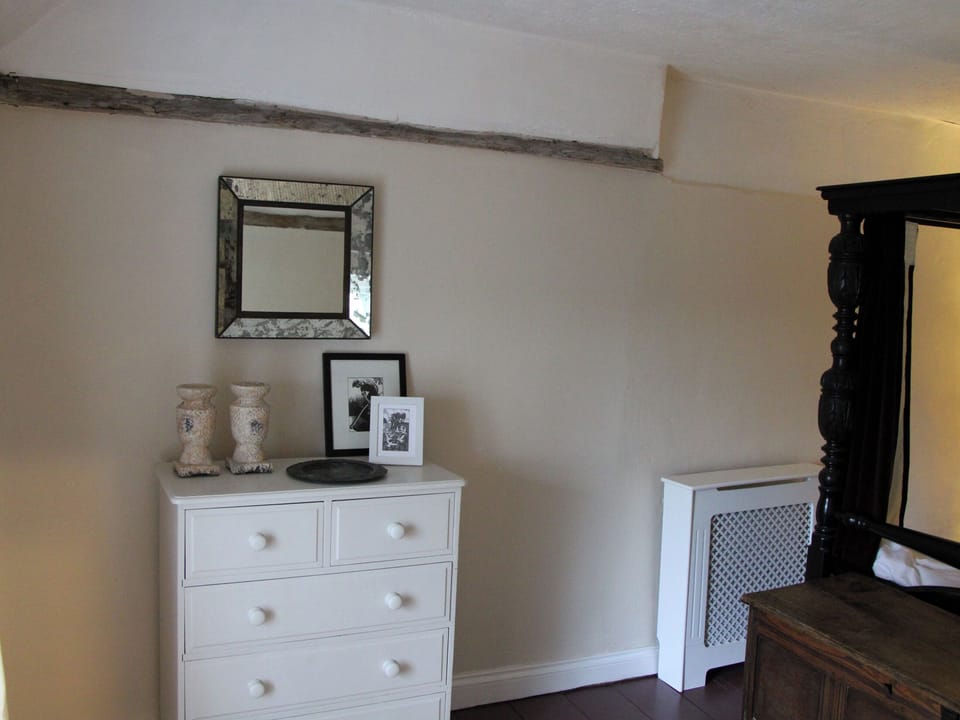 Four Poster bedroom | Lavender Cottage, Methwold, near Thetford