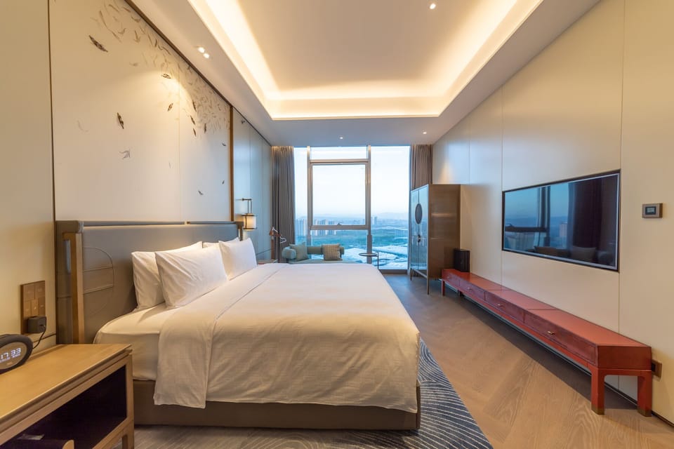 1 King Bed 1 Bedroom and Living Areas | Down comforters, minibar, in-room safe, desk