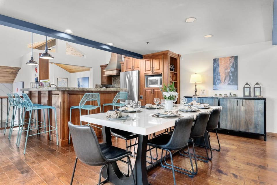 Large 8 person modern dining table & 5 person counter bar stools
