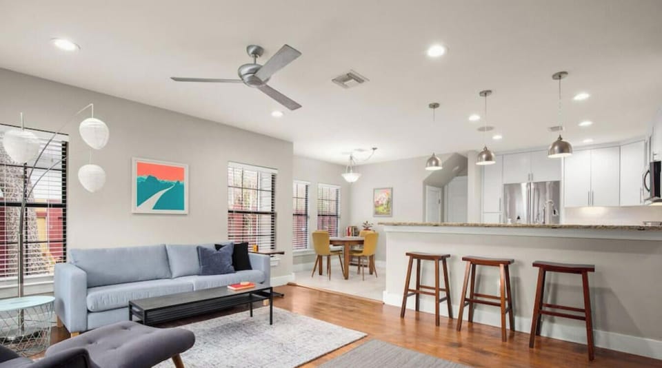 Spacious living room with large smart TV