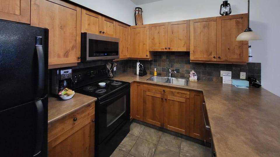 Condo, 2 Bedrooms | Private kitchen | Coffee/tea maker, fridge, oven, toaster