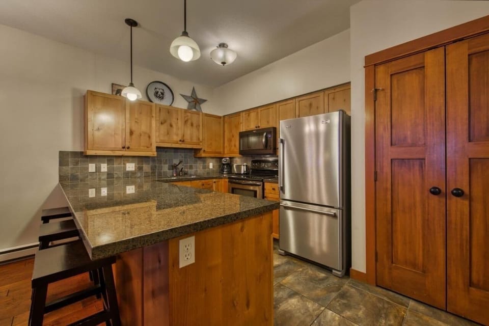 Condo, 2 Bedrooms | Private kitchen | Coffee/tea maker, fridge, oven, toaster