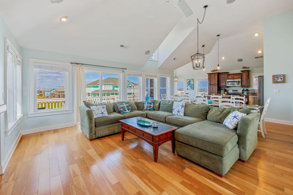 Stretch out on the cozy sofa for a revitalizing post-beach nap.