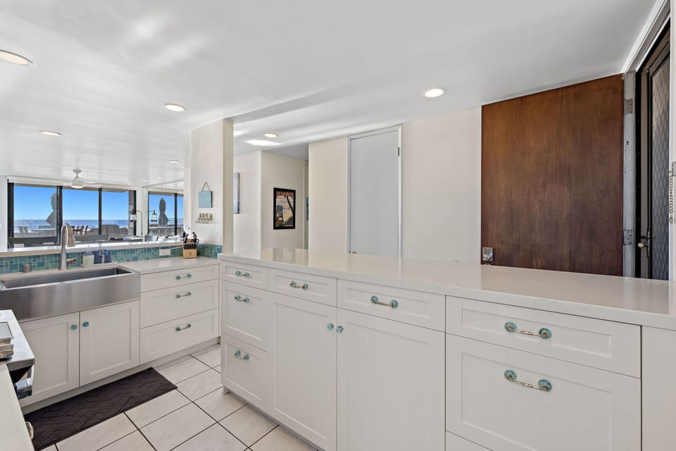 Large island perfect for the necessary counter-space to create grand meals