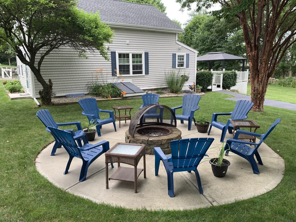 Fire pit, seats for 8, with lemongrass & citronella plants to fend off mosquitos