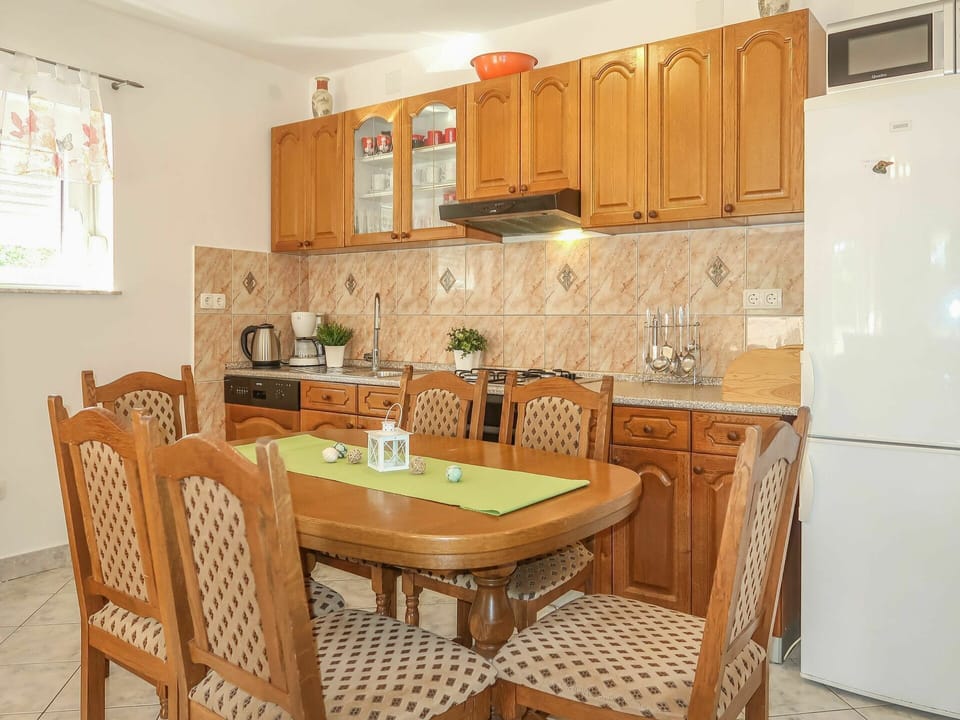 Furniture, Cabinetry, Countertop, Chair, Table, Wood, Kitchen Stove, Kitchen Appliance, Kitchen, Kitchen Sink