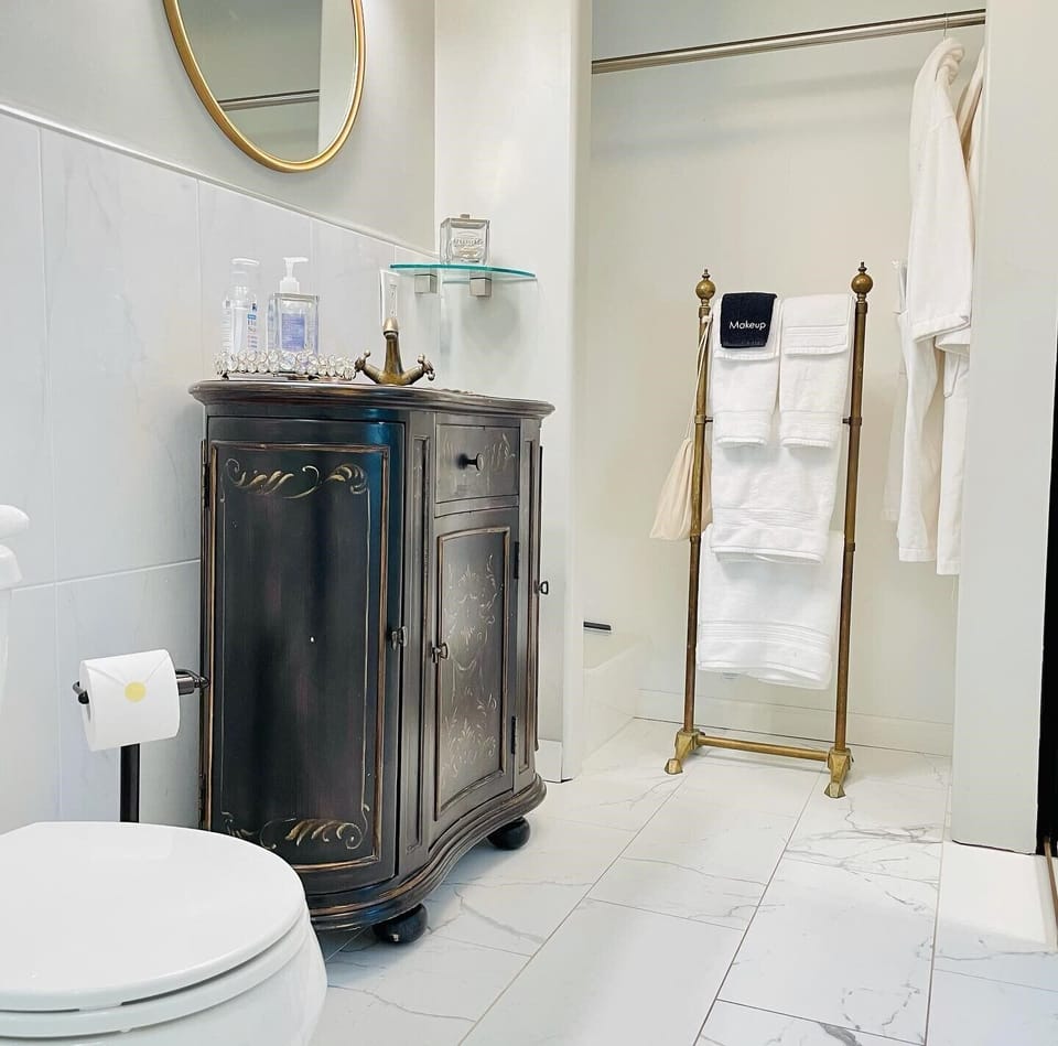 Old world Italian style bathroom to rose garden suite